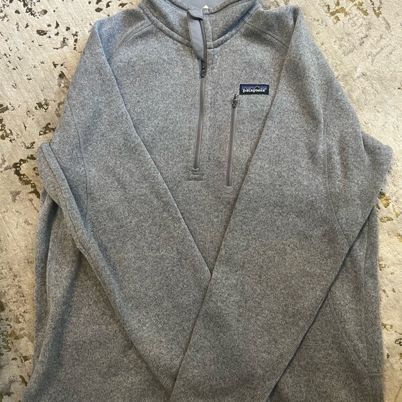 A grey Patagonia sweater with zipper and chest pocket. Comfy and warm. Large. - Picture 2 of 4
